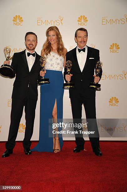 Actors Aaron Paul, Anna Gunn and Bryan Cranston, winners of Outstanding Drama Series for "Breaking Bad" posing at the 66th Annual Primetime Emmy...