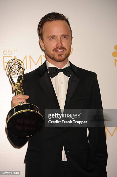 Actor Aaron Paul, winner of Outstanding Supporting Actor In A Drama Series and Outstanding Drama Series for "Breaking Bad" posing at the 66th Annual...