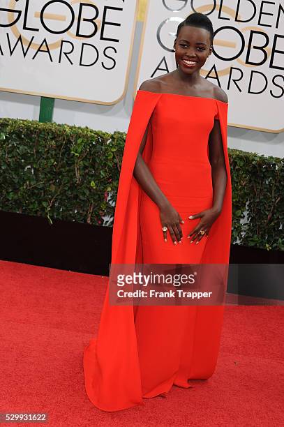 Actress Lupita Nyong'o arrives at the 71st Annual Golden Globe Awards held at The Beverly Hilton Hotel.