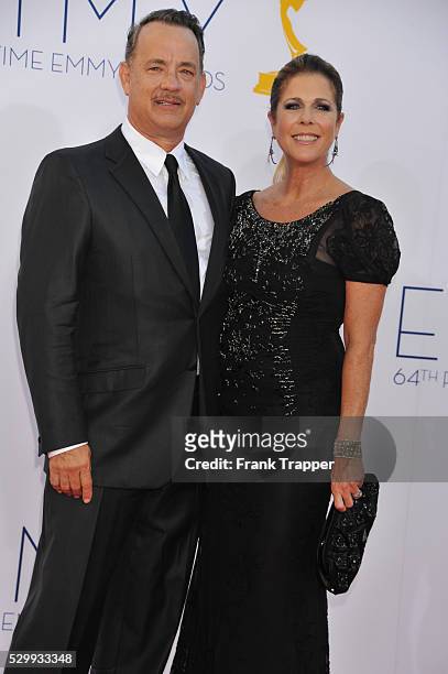 Actors Tom Hanks and actress, wife Rita Wilson arrive at the 64th Annual Primetime Emmy Awards held at the Nokia Theater L.A. Live.