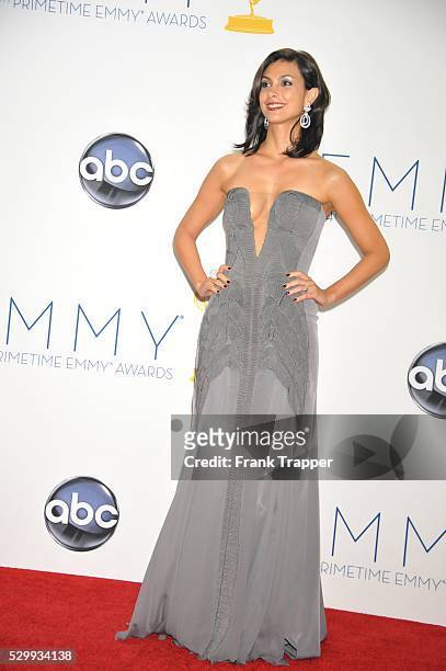 Morena Baccarin posing in the press room at the 64th Annual Emmy Awards held at the Nokia Theatre L.A. Live