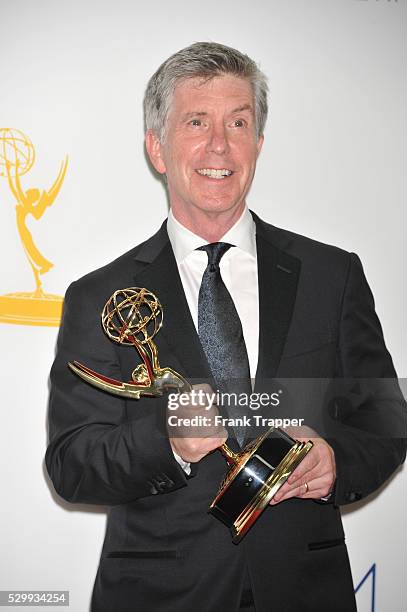 Host Tom Bergeron posing with his Emmy' for Outstanding Host for a Reality or Reality-Competition Program Dancing With The Stars at the 64th Annual...