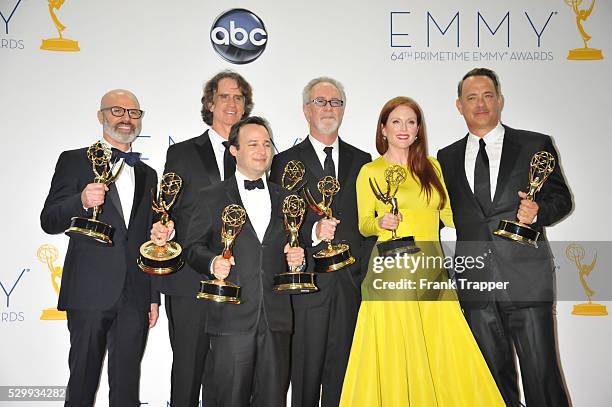 Producer Steven Shareshian, director Jay Roach, writer Danny Strong, producer Gary Goetzman, actress Julianne Moore, and producer Tom Hanks pose in...