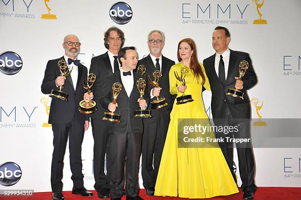 Producer Steven Shareshian, director Jay Roach, writer Danny Strong, producer Gary Goetzman, actress Julianne Moore, and producer Tom Hanks pose in...