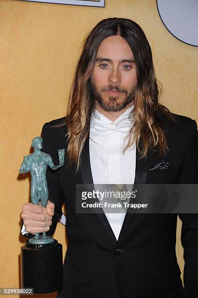 Actor Jared Leto, winner of the Outstanding Performance by a Male Actor in a Supporting Role award, posing at the 20th Annual Screen Actors Guild...