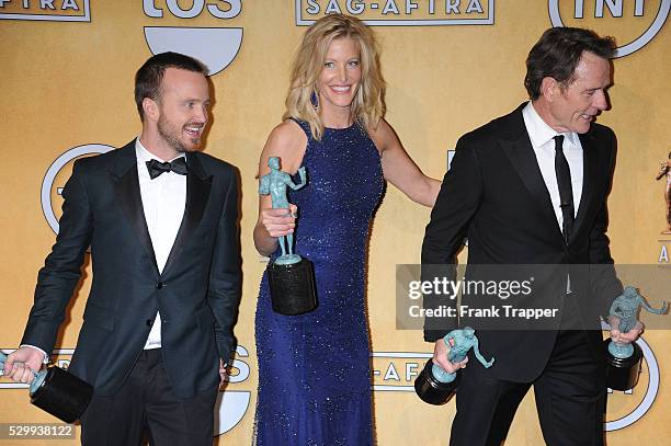 Aaron Paul, Anna Gunn and Bryan Cranston, members of the cast of "Breaking Bad", winner of the Best Ensemble in a Drama Series, pose pose at the 20th...