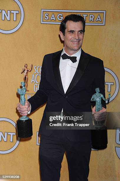 Actor Ty Burrell, winner of the Outstanding Performance by a Male Actor in a Comedy Series and Outstanding Performance by an Ensemble in a Comedy...