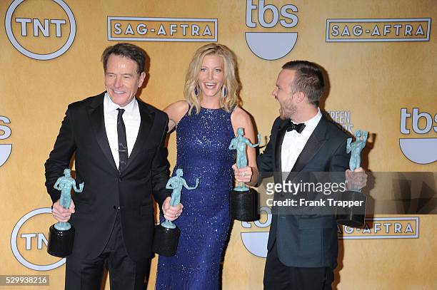 Bryan Cranston, Anna Gunn and Aaron Paul, members of the cast of "Breaking Bad", winner of the Best Ensemble in a Drama Series, pose pose at the 20th...