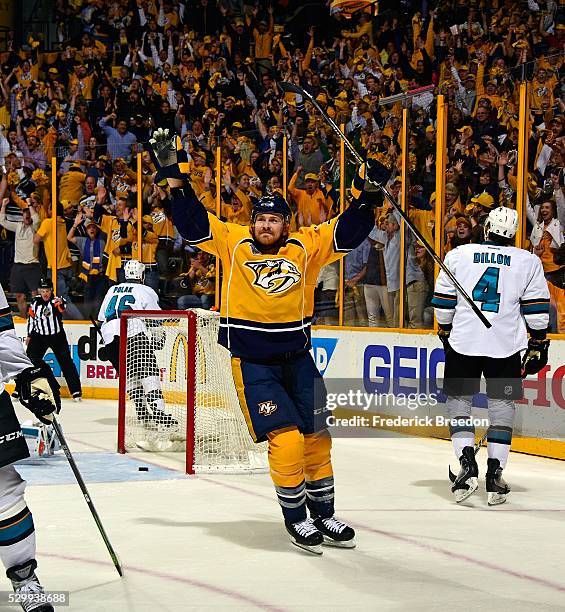 Colin Wilson of the Nashville Predators holds his hands up in celebration after scoring the game tying goal during the third period of Game Six of...