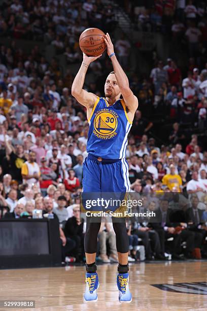 Stephen Curry of the Golden State Warriors shoots the ball against the Portland Trail Blazers in Game Four of the Western Conference Semifinals...