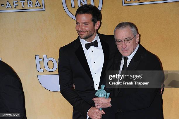 Actor Bradley Cooper and presenter Robert De Niro pose at the 20th Annual Screen Actors Guild Awards held at The Shrine Auditorium.