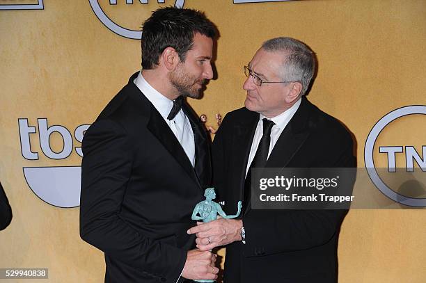 Actor Bradley Cooper and presenter Robert De Niro pose at the 20th Annual Screen Actors Guild Awards held at The Shrine Auditorium.