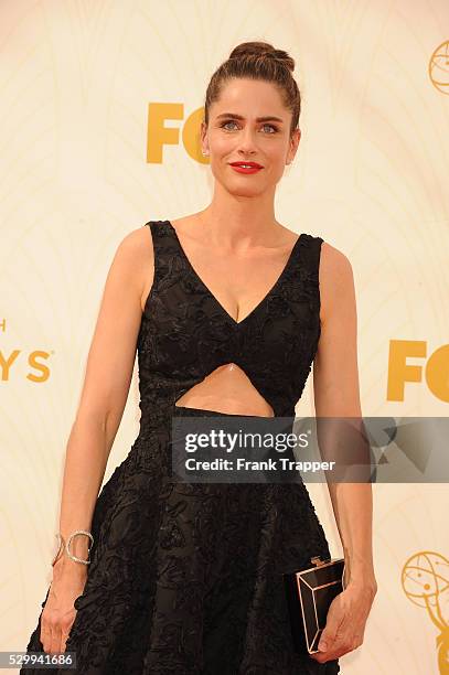 Actress Amanda Peet arrives at the 67th Annual Primetime Emmy Awards held at the Microsoft Theater.