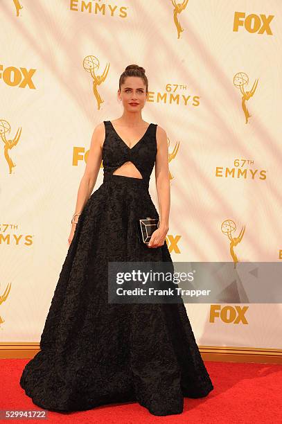 Actress Amanda Peet arrives at the 67th Annual Primetime Emmy Awards held at the Microsoft Theater.