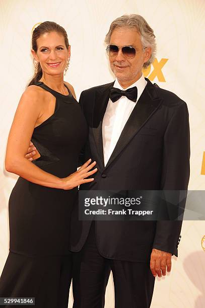 Actress Veronica Berti and recording artist Andrea Bocelli arrive at the 67th Annual Primetime Emmy Awards held at the Microsoft Theater.