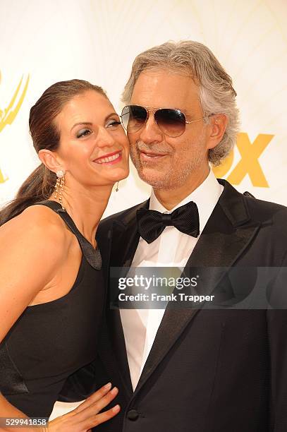 Actress Veronica Berti and recording artist Andrea Bocelli arrive at the 67th Annual Primetime Emmy Awards held at the Microsoft Theater.