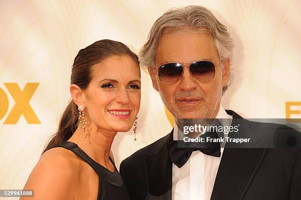 Actress Veronica Berti and recording artist Andrea Bocelli arrive at the 67th Annual Primetime Emmy Awards held at the Microsoft Theater.