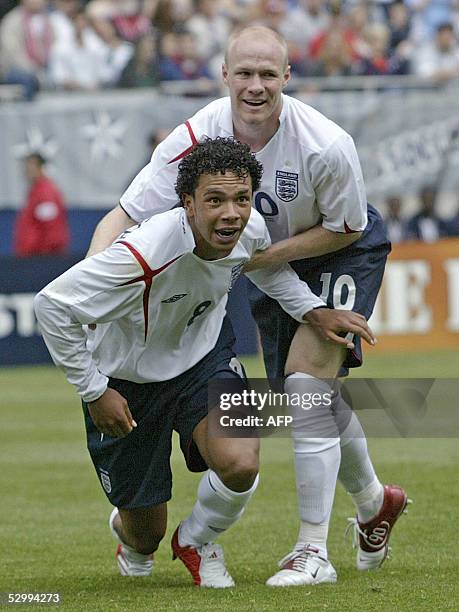England's Kieran Richardson and teammate Andy Johnson celebrate Richardson's second goal against the US during the first half of their friendly match...