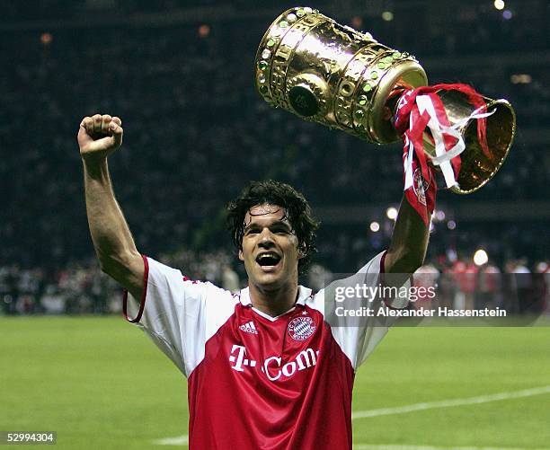 Michael Ballack of Bayern Munich team ecstatically holds a replica of the Trophy after winning the German Football Federations Cup Final between FC...