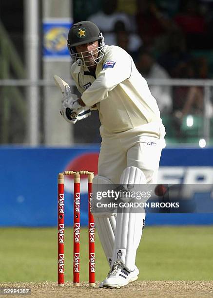 Pakistan batsman Bazid Khan is about to drive West Indies bowler Reon King during the 3rd day of the 1st Test at the Kensington Oval in Bridgetown 28...