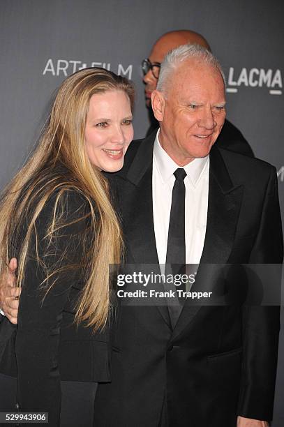 Actor Mlcolm McDowell and guest Kelley Kuhr arrive at LACMA 2012 Art + Film Gala held at LACMA.