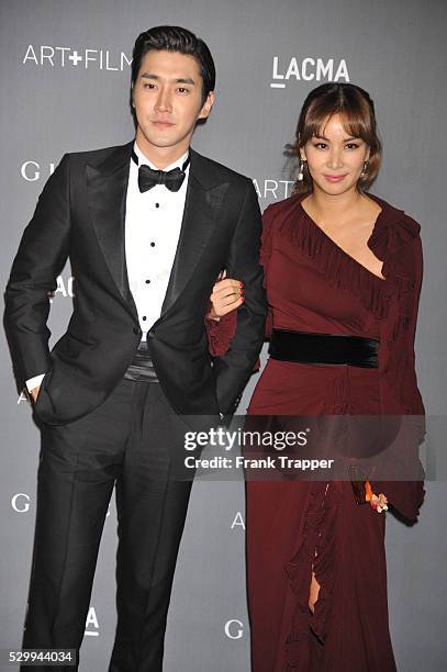 Singer Choi Si Won and guest arrive at LACMA 2012 Art + Film Gala held at LACMA.