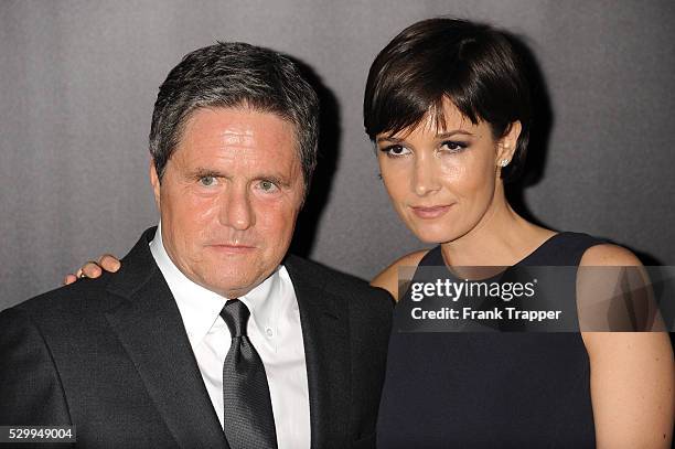 Chairman and Chief Executive at Paramount Pictures Brad Grey and wife arrive at the premiere of "Interstellar" held at the TCL Chinese Theater in...