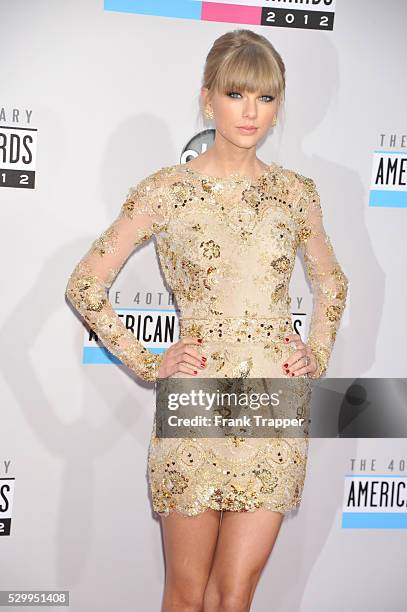 Singer Taylor Swift arrives the 40th American Music Awards held at Nokia Theatre L.A. Live.