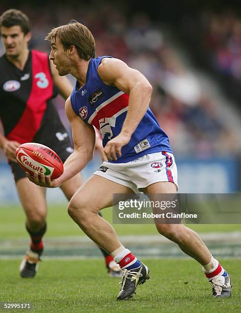 Scott West of the Bulldogs in action during the round 10 AFL match between the Essendon Bombers and the Western Bulldogs at the Telstra Dome on May...