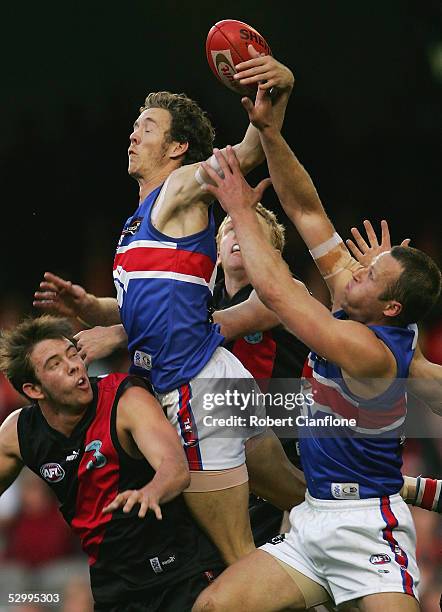 Robert Murphy of the Bulldogs rises above the pack in an attempt to mark during the round 10 AFL match between the Essendon Bombers and the Western...