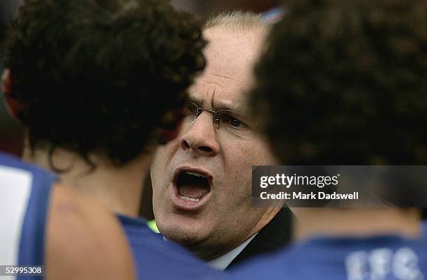 Rodney Eade coach of the Bulldogs addresses his players during the AFL Round 10 match between the Essendon Bombers and the Western Bulldogs at...