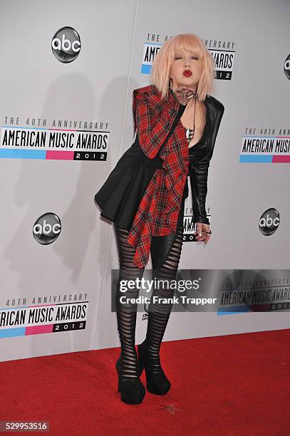 Singer Cyndi Lauper arrives the 40th American Music Awards held at Nokia Theatre L.A. Live.