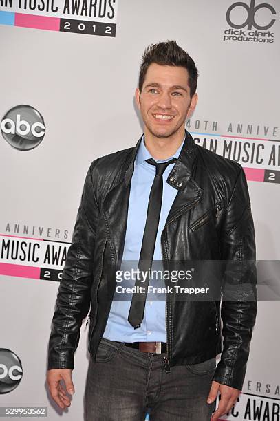 Singer/writer Andy Grammer arrives the 40th American Music Awards held at Nokia Theatre L.A. Live.