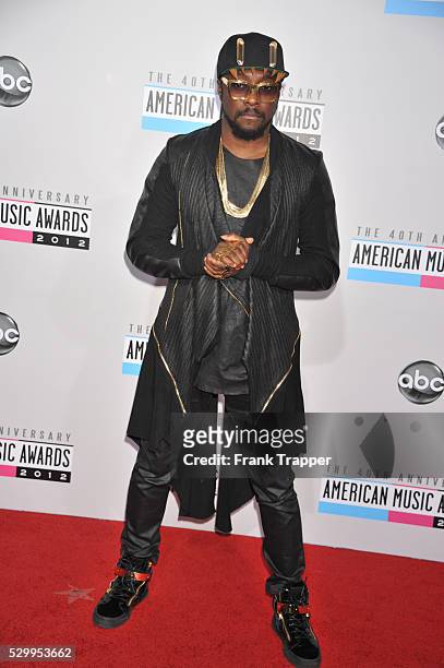 Musician wil.i.am arrives the 40th American Music Awards held at Nokia Theatre L.A. Live.