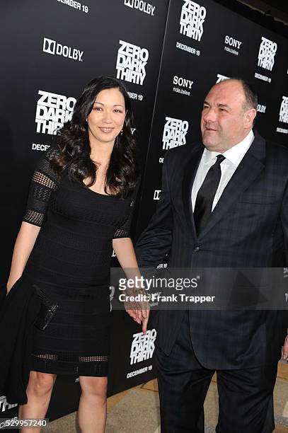 Actor James Gandolfini and guest arrive at the premiere of Zero Dark Thirty held at the Dolby Theater in Hollywood.