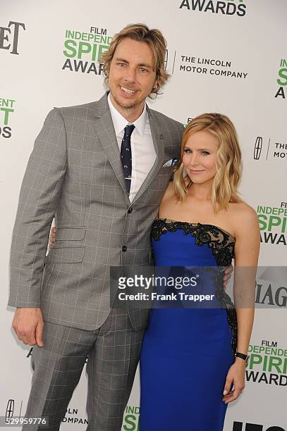 Actors Dax Shepard and Kristen Bell arrive at the 2014 Film Independent Spirit Awards at Santa Monica Beach.