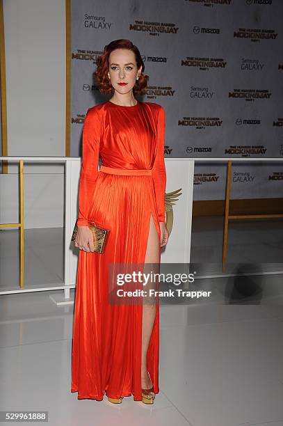 Actress Jenna Malone arrives at the premiere off "The Hunger Games: Mockingjay Part 1" held at Nokia Theater L.A. Live.