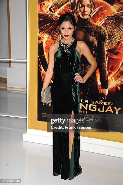 Actress Bianca Santos arrives at the premiere off "The Hunger Games: Mockingjay Part 1" held at Nokia Theater L.A. Live.