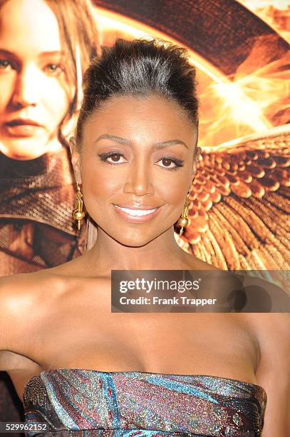 Actress Patina Miller arrives at the premiere off "The Hunger Games: Mockingjay Part 1" held at Nokia Theater L.A. Live.