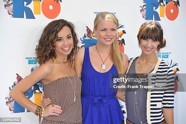 Nickelodeon's "Big Time Rush" cast members Savannah Jayde, Kelli Goss and Denyse Tontz arrive at the premiere of "Rio" held at Grauman's Mann Chinese...