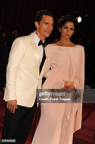 Actor Matthew McConaughey and wife Camilla Alves arrive at the 86th Academy Awards held at Loews Hollywood Hotel.