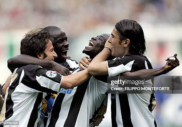 Juventus Alessandro Del Piero , Lilian Thuram and Adrian Mutu celebrate Stephen Appiah after he scored a third goal against Cagliari during the last...