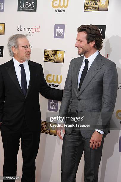 Director Steven Spielberg and actor Bradley Cooper arrive at the 18th Annual Critics' Choice Movie Awards held at Barker Hanger in Santa Monica,...