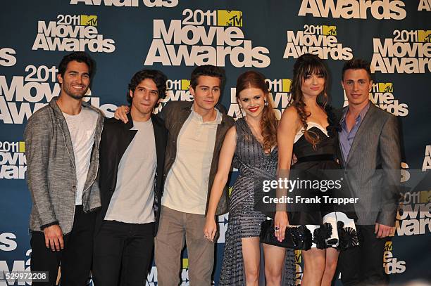 The cast of "Teen Wolf", actors Tyler Hoechlin, Tyler Posey Dylan O'Brien, Holland Roden, Crystal Reed, and Colton Haynes pose in the press room at...