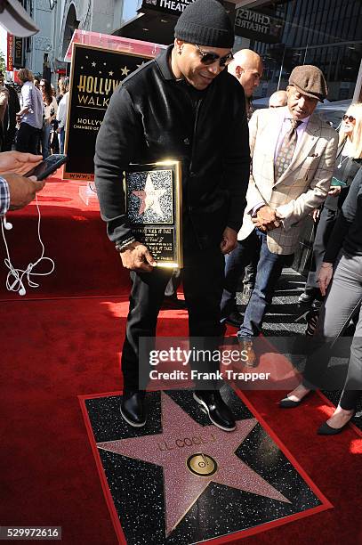 Rapper-actor LL Cool J is honored with a Star on the Hollywood Walk of Fame.