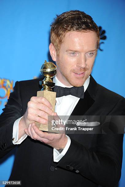 Actor Damian Lewis, winner of Best Actor in a Television Series, Drama for Homeland, posing at the 70th Annual Golden Globe Awards held at The...