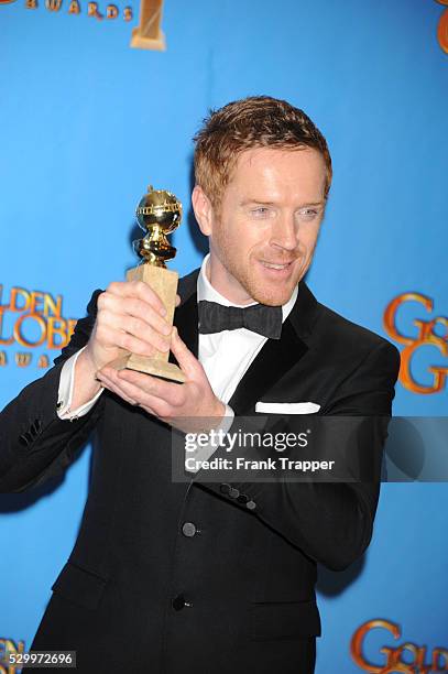 Actor Damian Lewis, winner of Best Actor in a Television Series, Drama for Homeland, posing at the 70th Annual Golden Globe Awards held at The...