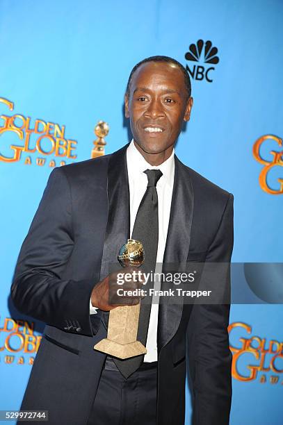 Actor Don Cheadle, winner Best Actor in a Television Series, Comedy or Musical for House of Lies, posing at the 70th Annual Golden Globe Awards held...