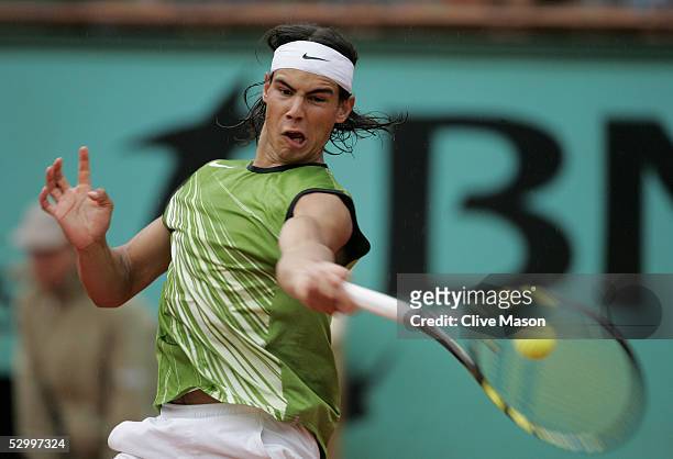 Rafael Nadal of Spain in action during his fourth round match against Sebastien Grosjean of France during the seventh day of the French Open at...