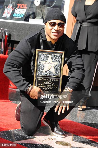 Rapper-actor LL Cool J is honored with a Star on the Hollywood Walk of Fame.